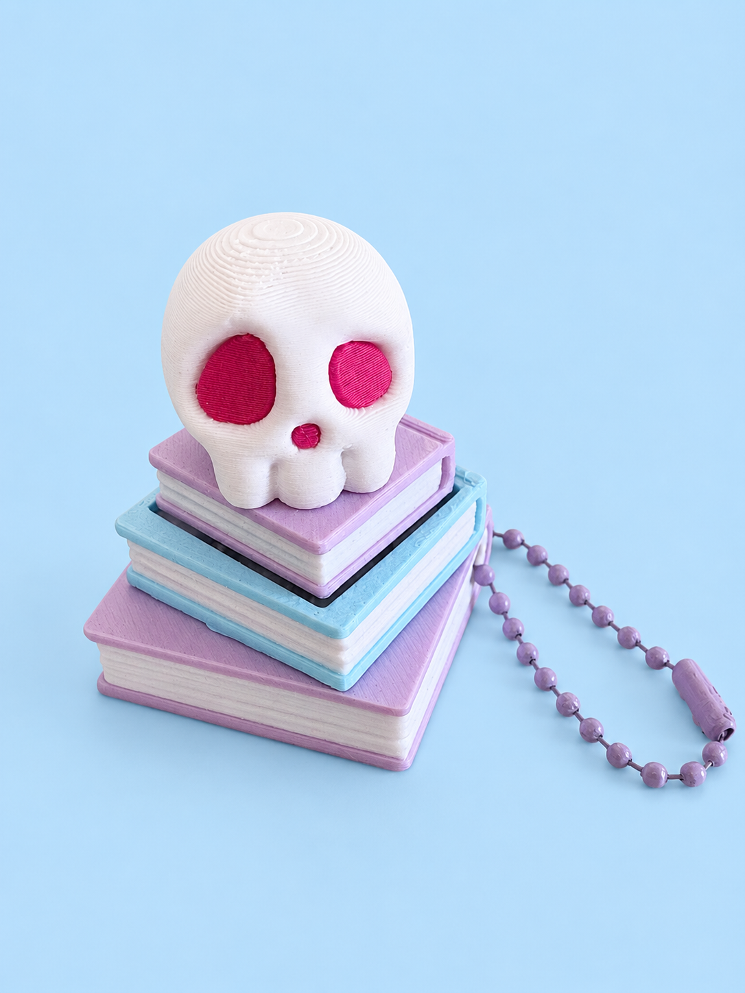 Skull and Book Stack Keyring Fidget Clicker