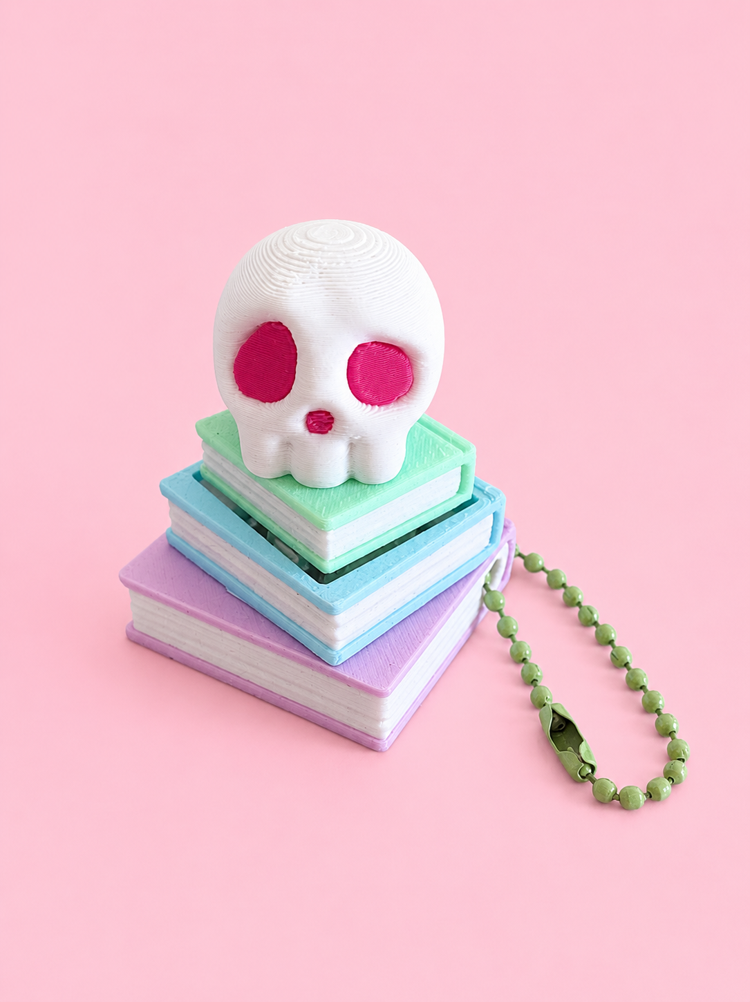 Skull and Book Stack Keyring Fidget Clicker